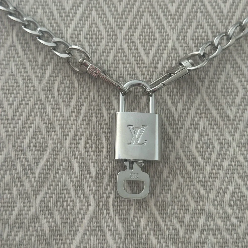 Louis Vuitton Silver Padlock w/ key & 27” Chain   to be worn as necklace